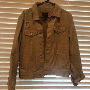Beige jacket with distressing